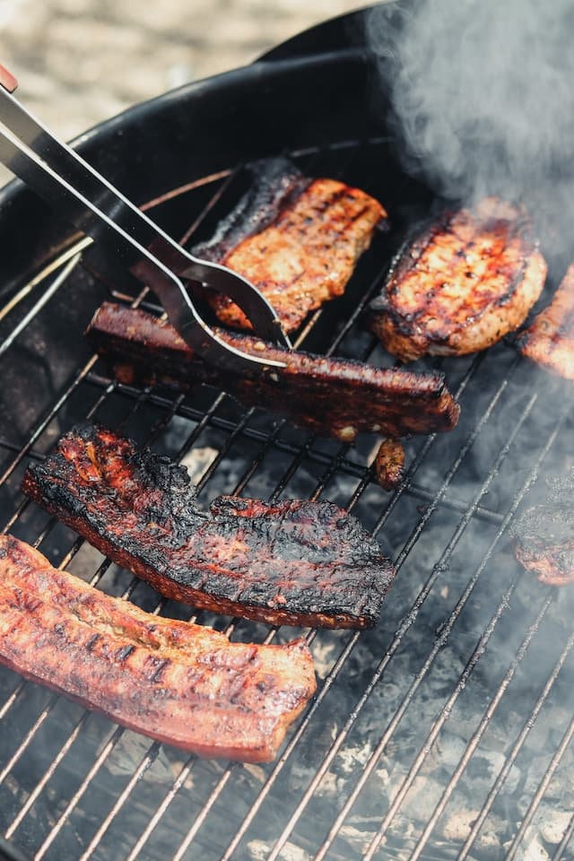 Ribs smoking on the grill